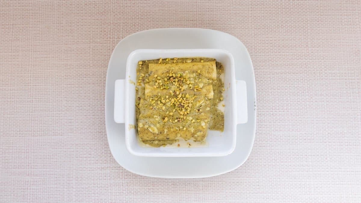 Cannelloni With Ricotta — In a creamy pesto sauce, pistachio on top.