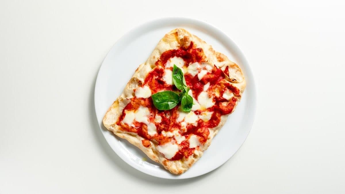 Margherita pizza with tomato, mozzarella and basil